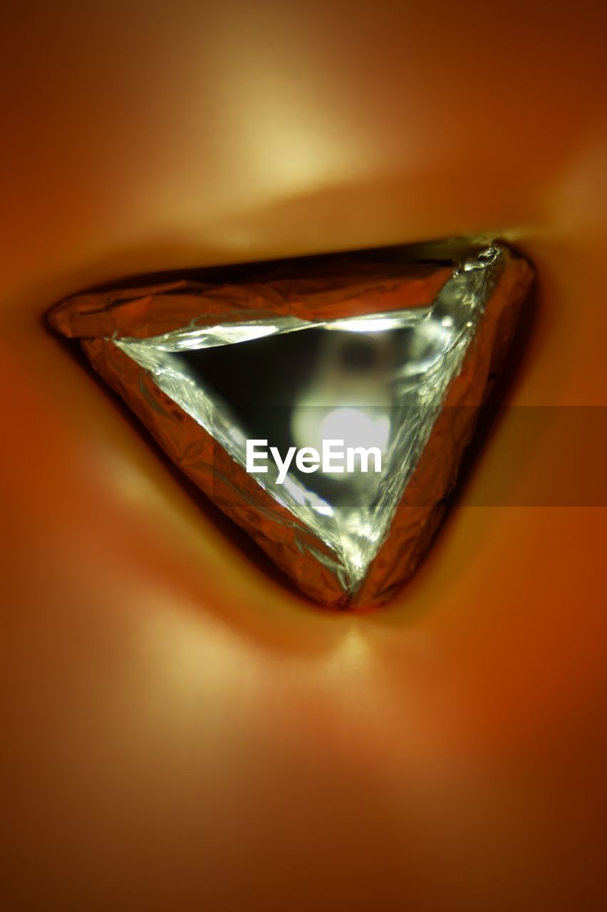 EloEmenike Back Lit Close-up Day Foil  Indoors  Jewelry Macro Macro Shot Mix Yourself A Good Time No People On Market Shiny Single Object Studio Shot Triangle Yellow Mix Yourself A Good Time Shapes Shapes And Forms Geometric Shape Backlit Abstract Abstract Photography Paint The Town Yellow