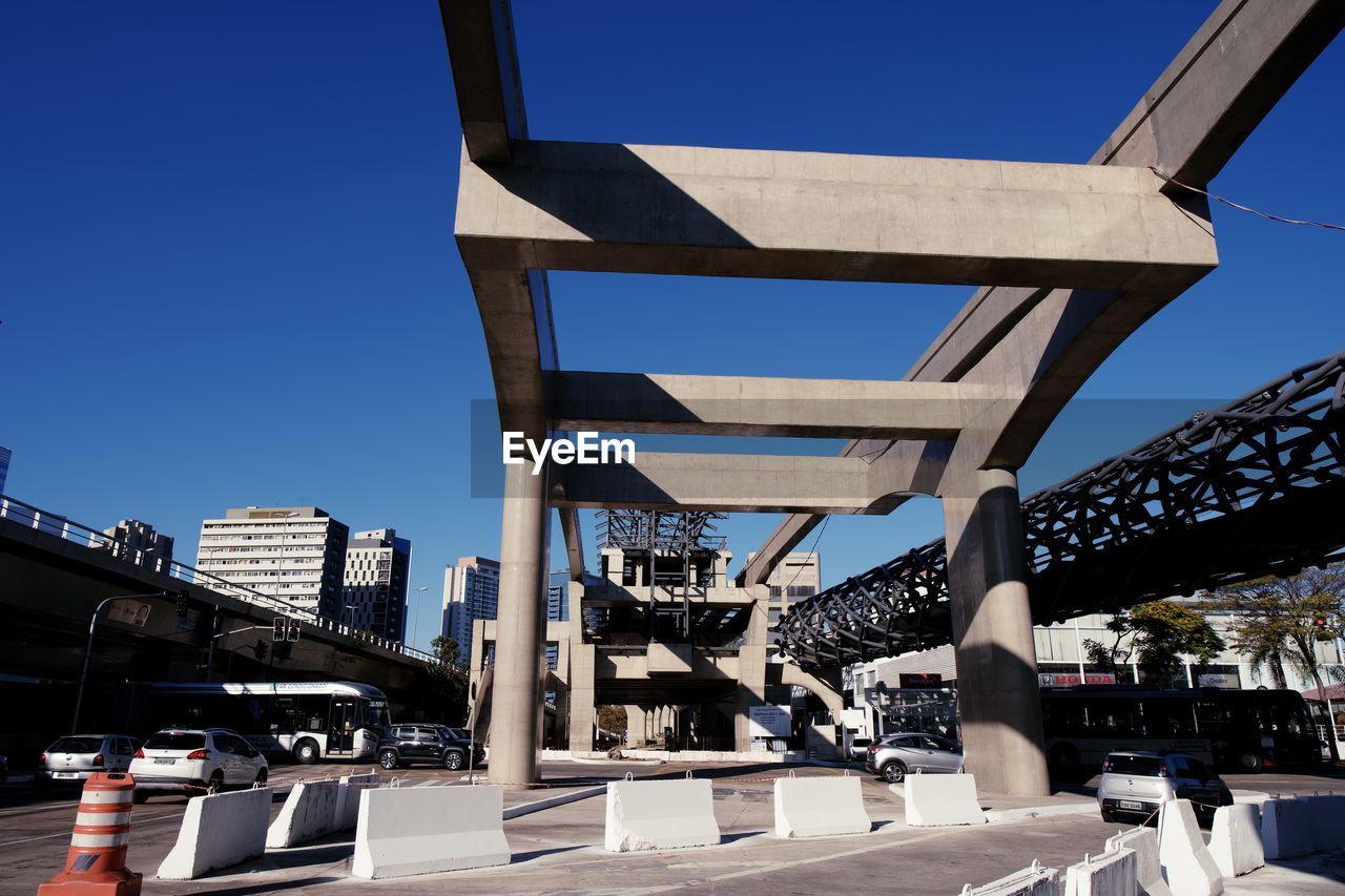 View of bridge against clear blue sky