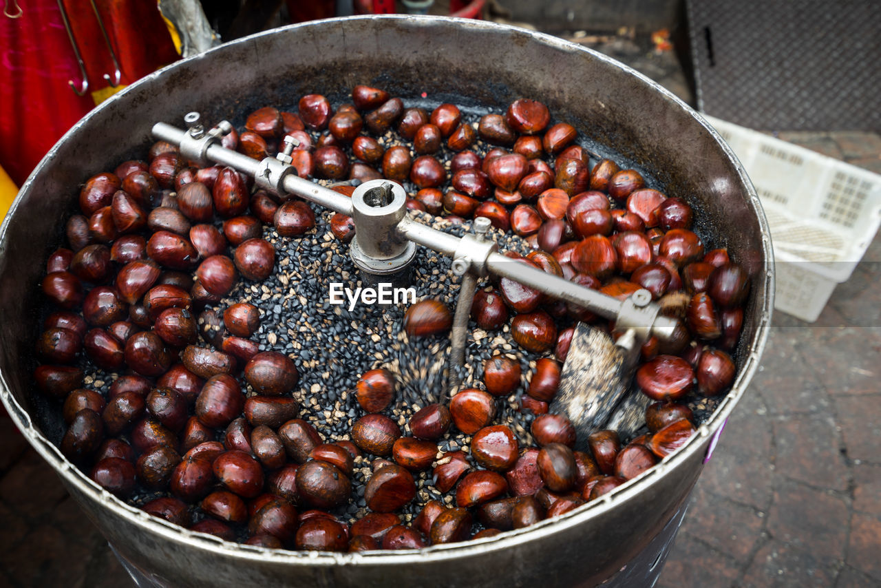 Close up of chestnuts illuminated by street light