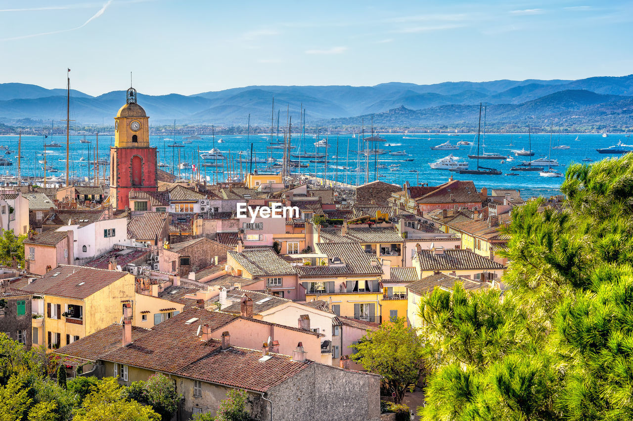 Scenic view of saint tropez in autumn colors against the mediterranean sea