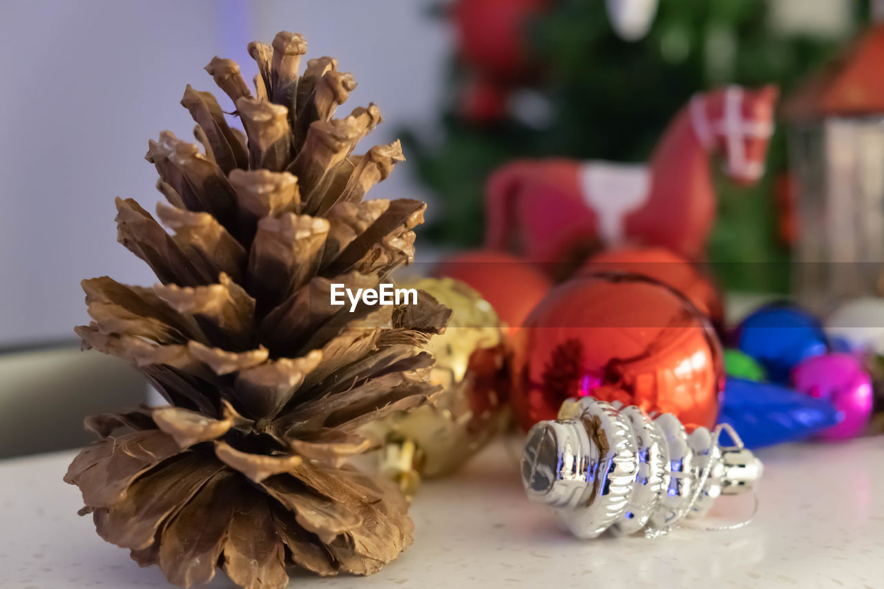 Close-up of christmas decorations on table