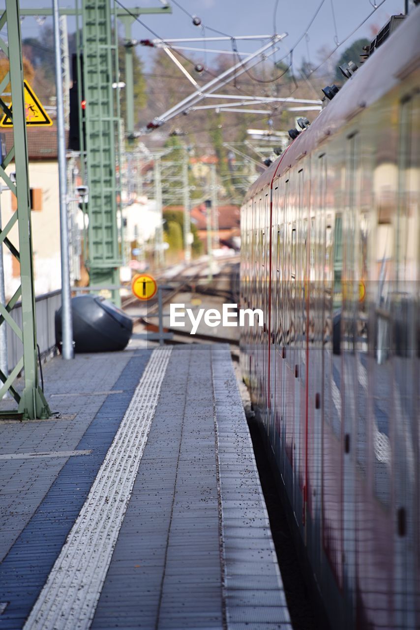 Cropped train at railway station