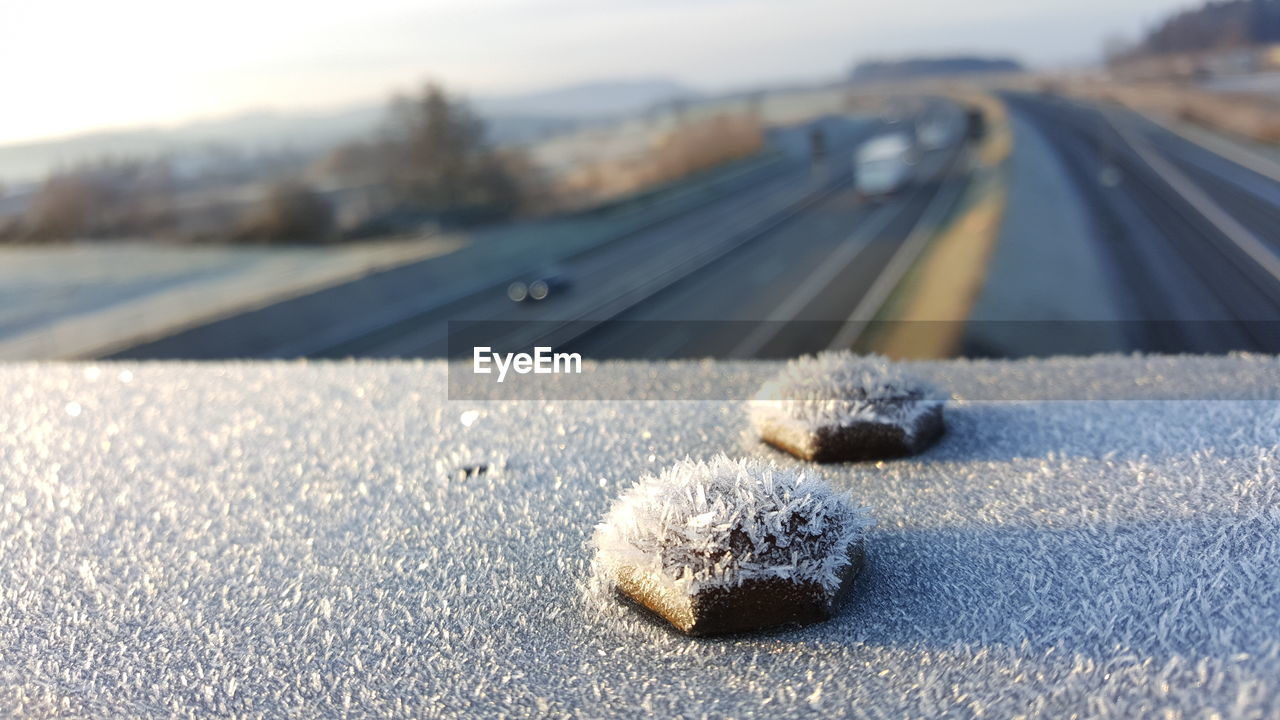 High angle view of railing covered with frost