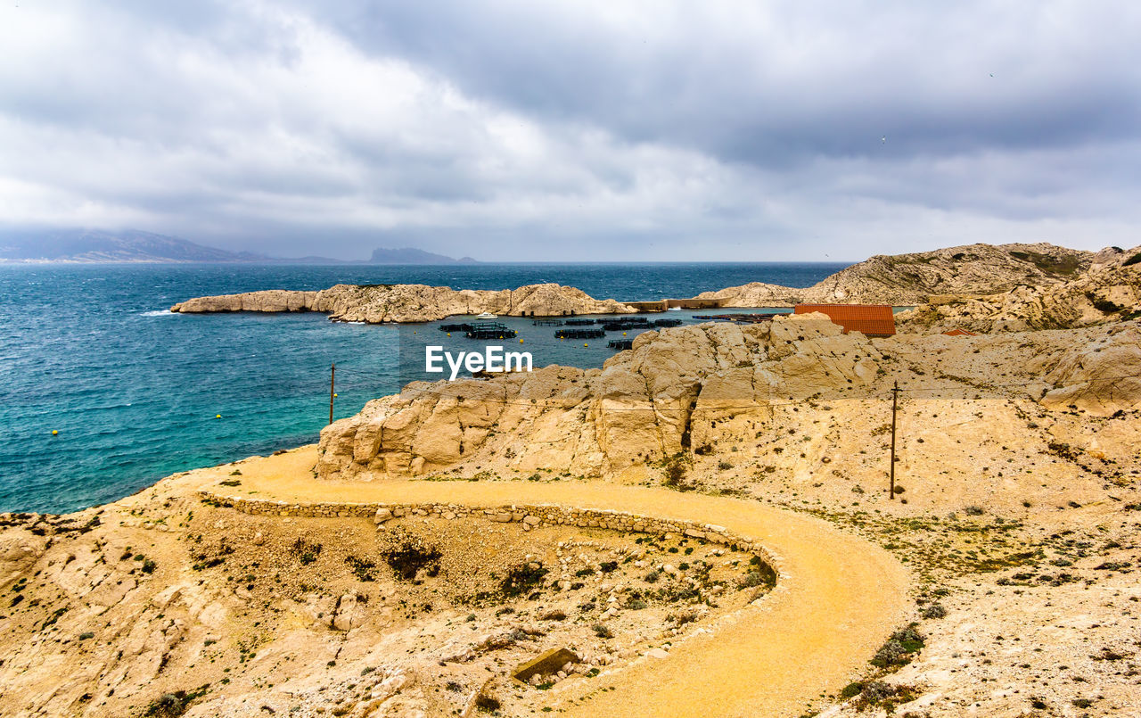 Scenic view of beach against sky