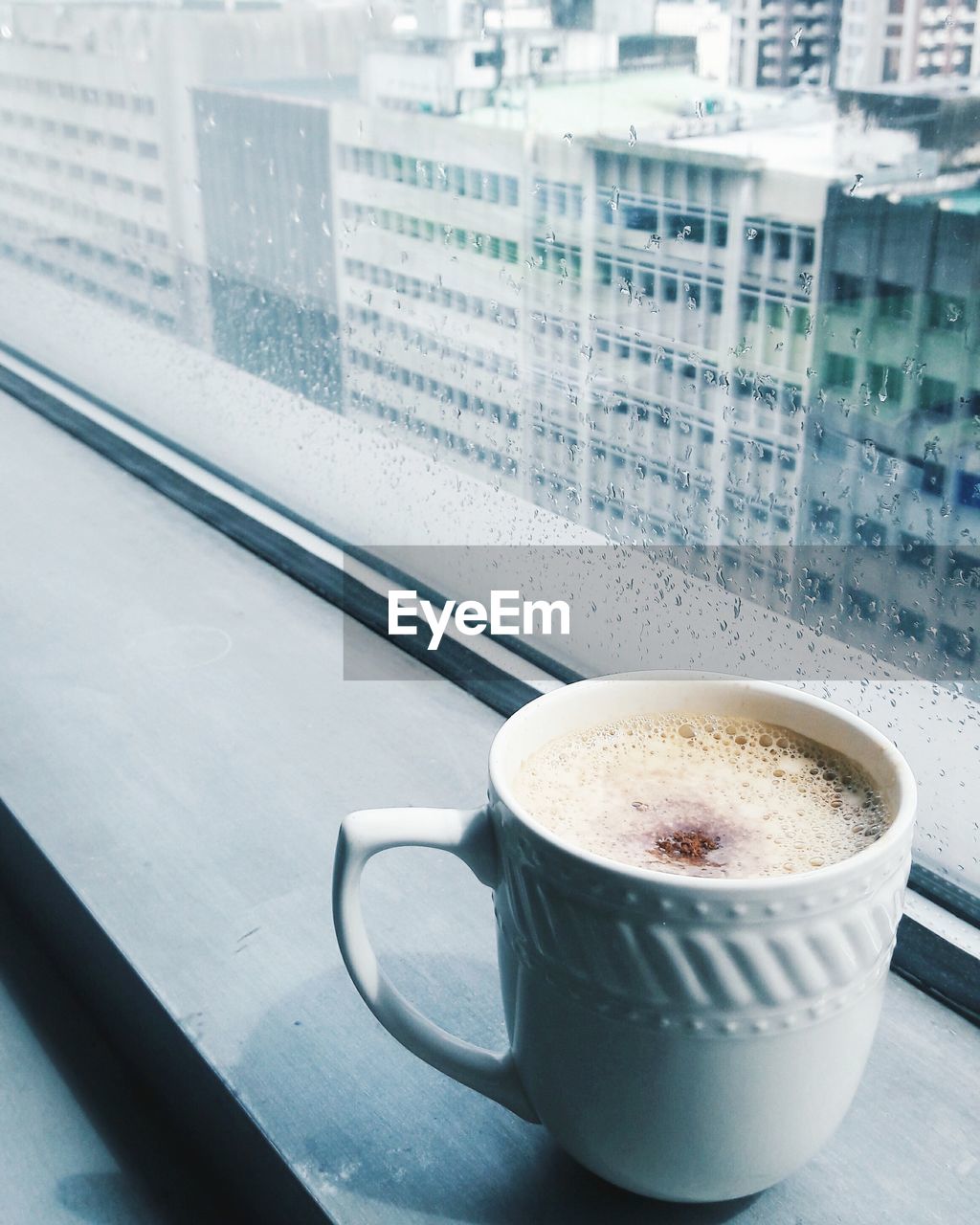 Close-up of coffee cup on table