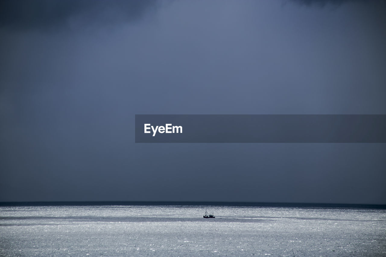 VIEW OF BEACH AGAINST SKY