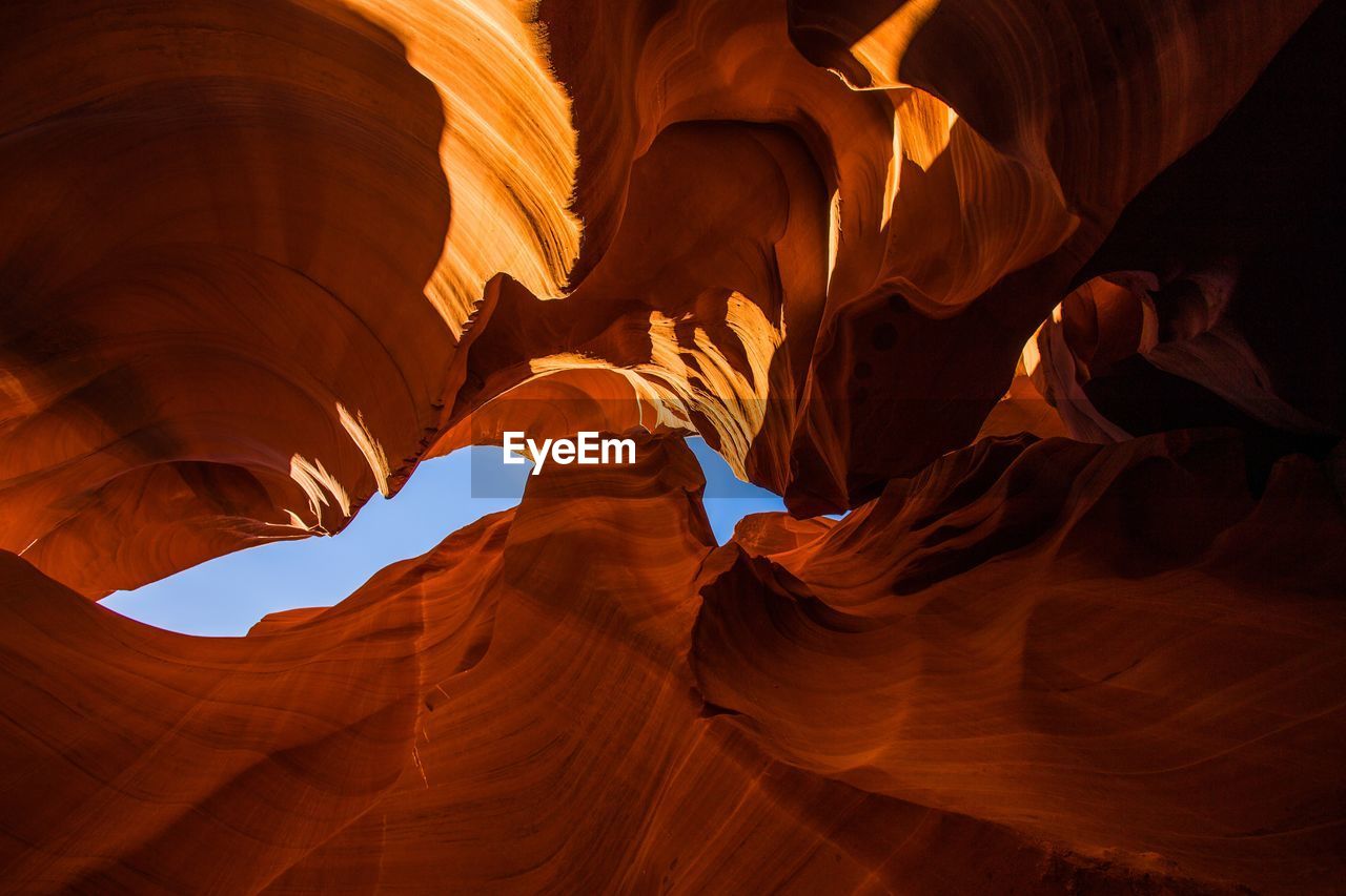 LOW ANGLE VIEW OF ROCK FORMATIONS AT CANYON