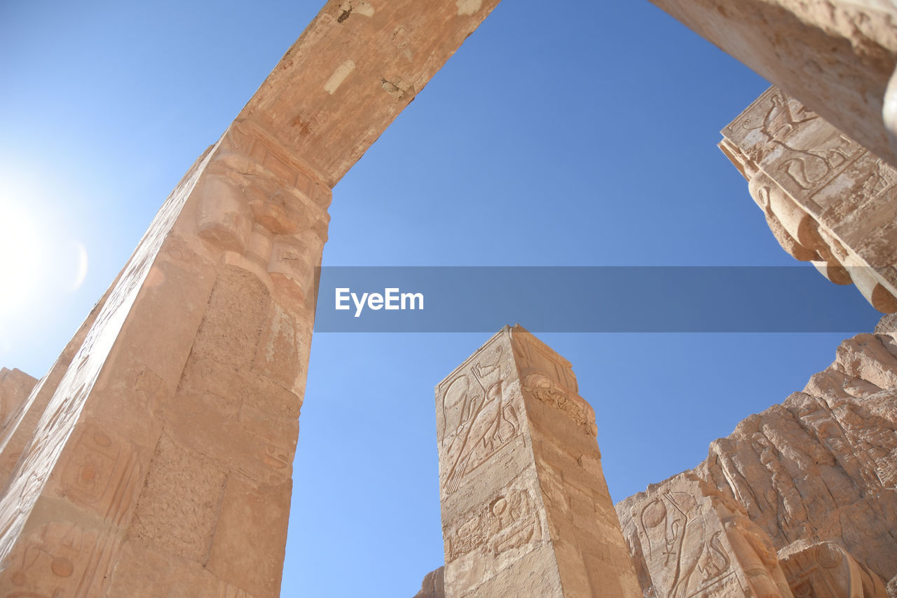 Low angle view from the temple of hatshepsut against blue sky