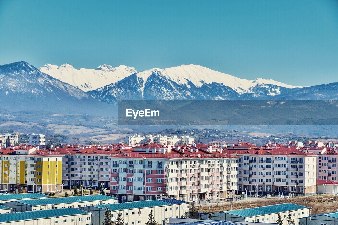 View of cityscape with mountain range in background