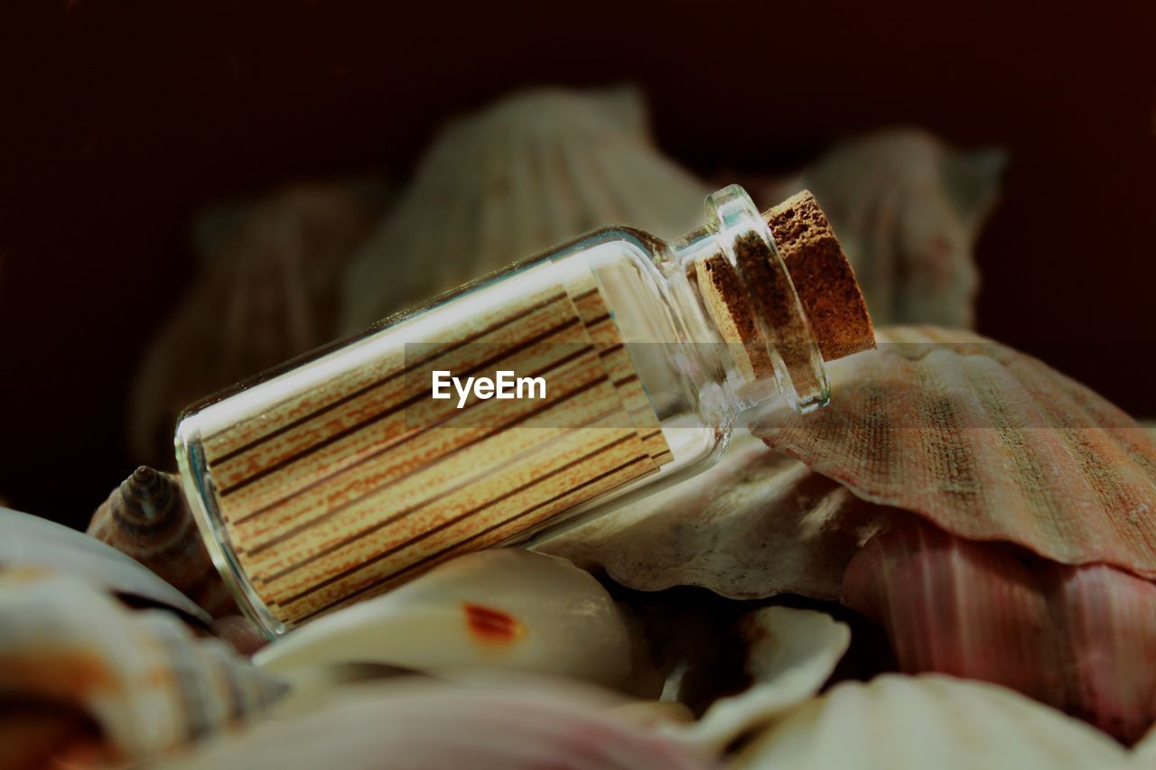 Close-up of small glass bottle