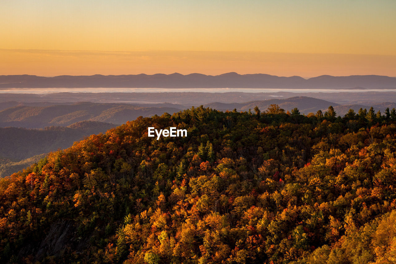 Scenic view of mountains during sunset in autumn