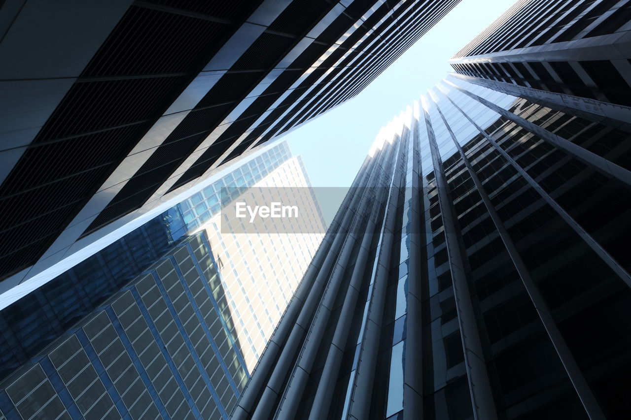 Low angle view of modern buildings against sky