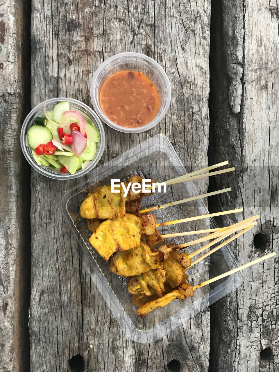 High angle view of food served on wooden table