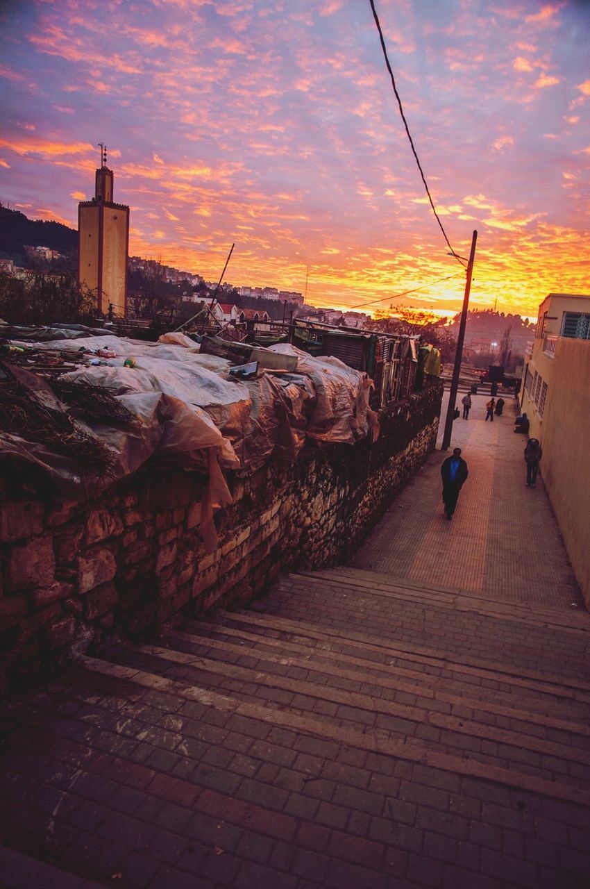 View down urban stairway at dusk