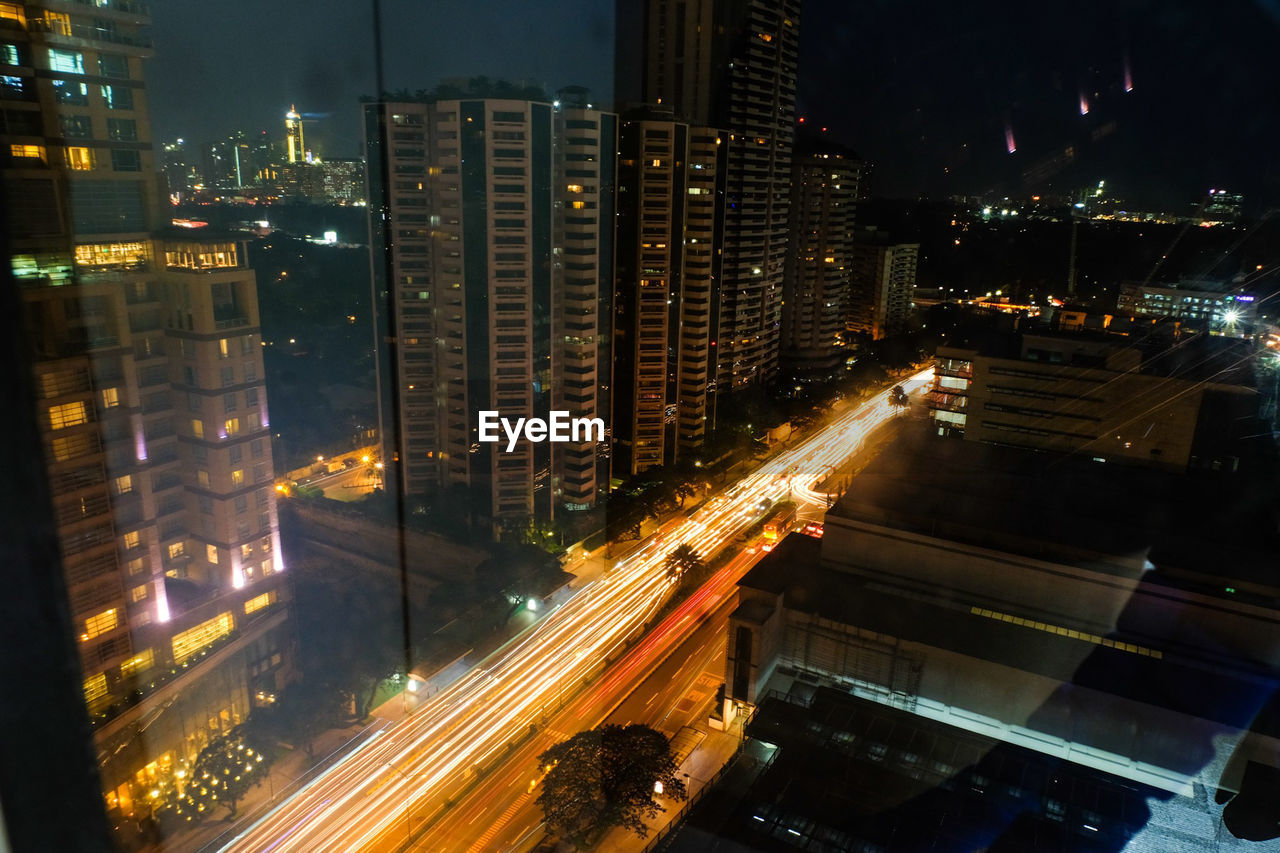 High angle view of illuminated buildings at night