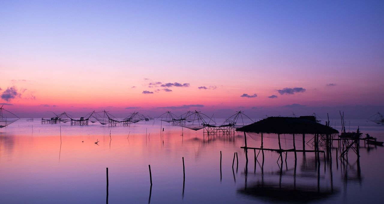 Scenic view of sea against sky at sunset