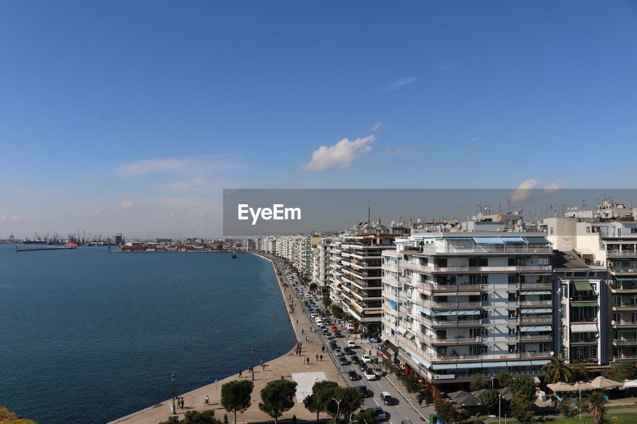 HIGH ANGLE VIEW OF CITYSCAPE IN THE SKY