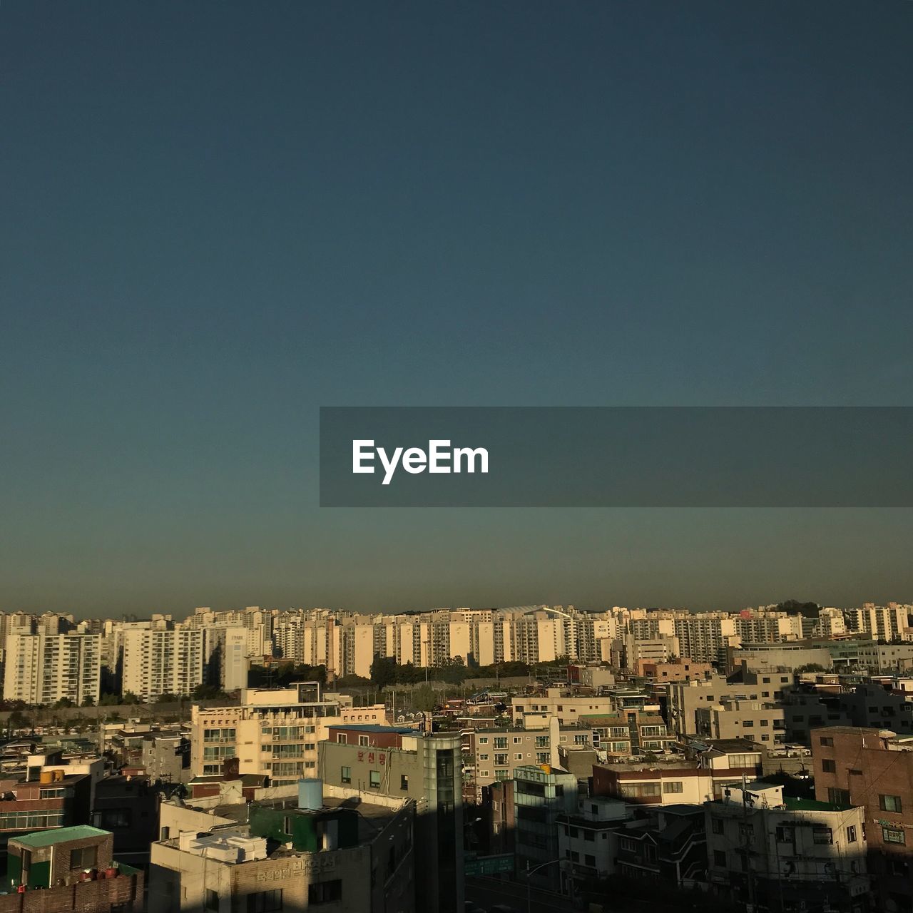 High angle view of buildings against clear sky