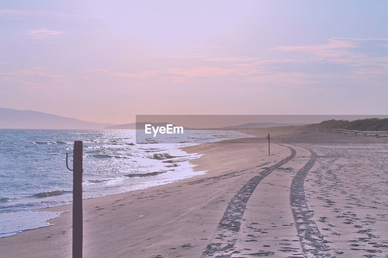 Scenic view of beach during sunset