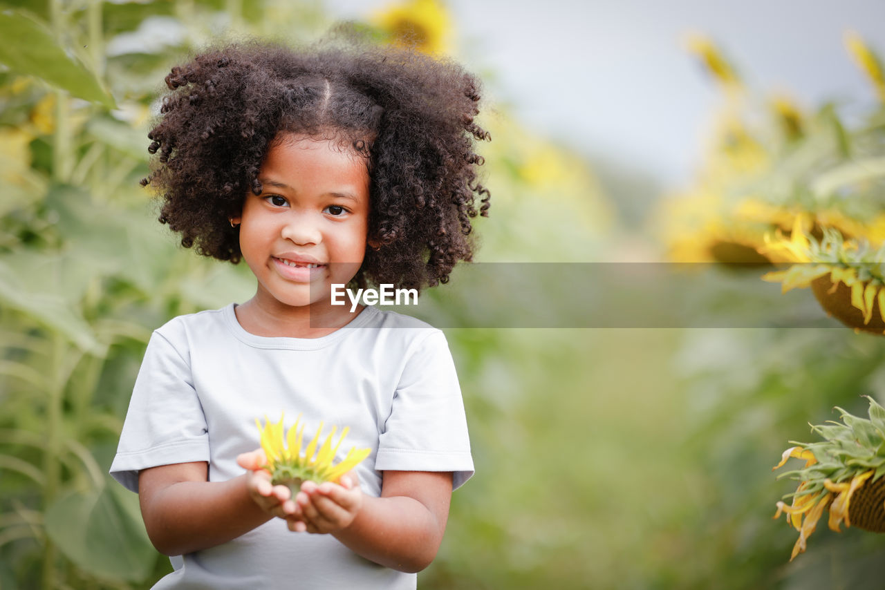 Portrait of cute girl smiling