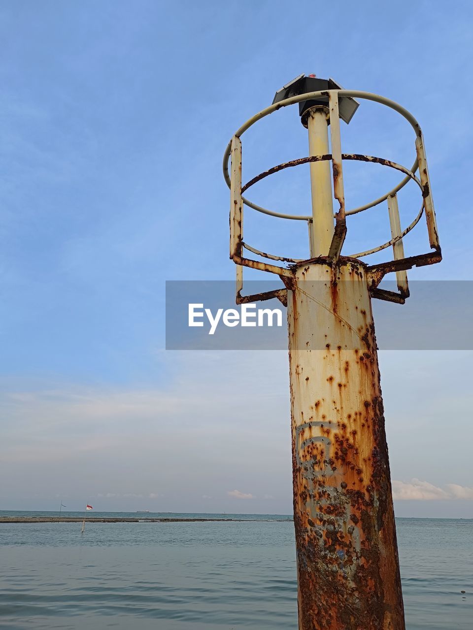 sky, water, tower, sea, nature, no people, blue, beach, day, land, ocean, horizon over water, outdoors, scenics - nature, horizon, wind, coast, cloud, tranquility, metal, beauty in nature, wood, tranquil scene
