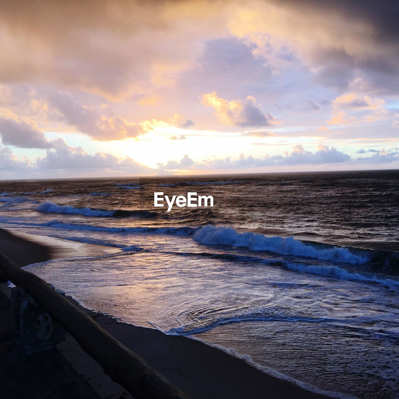 SCENIC VIEW OF SEA DURING SUNSET