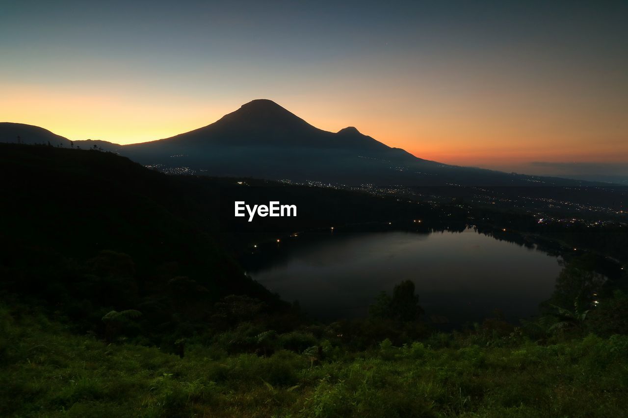 A sunrise view with sindoro mount and menjer cake background