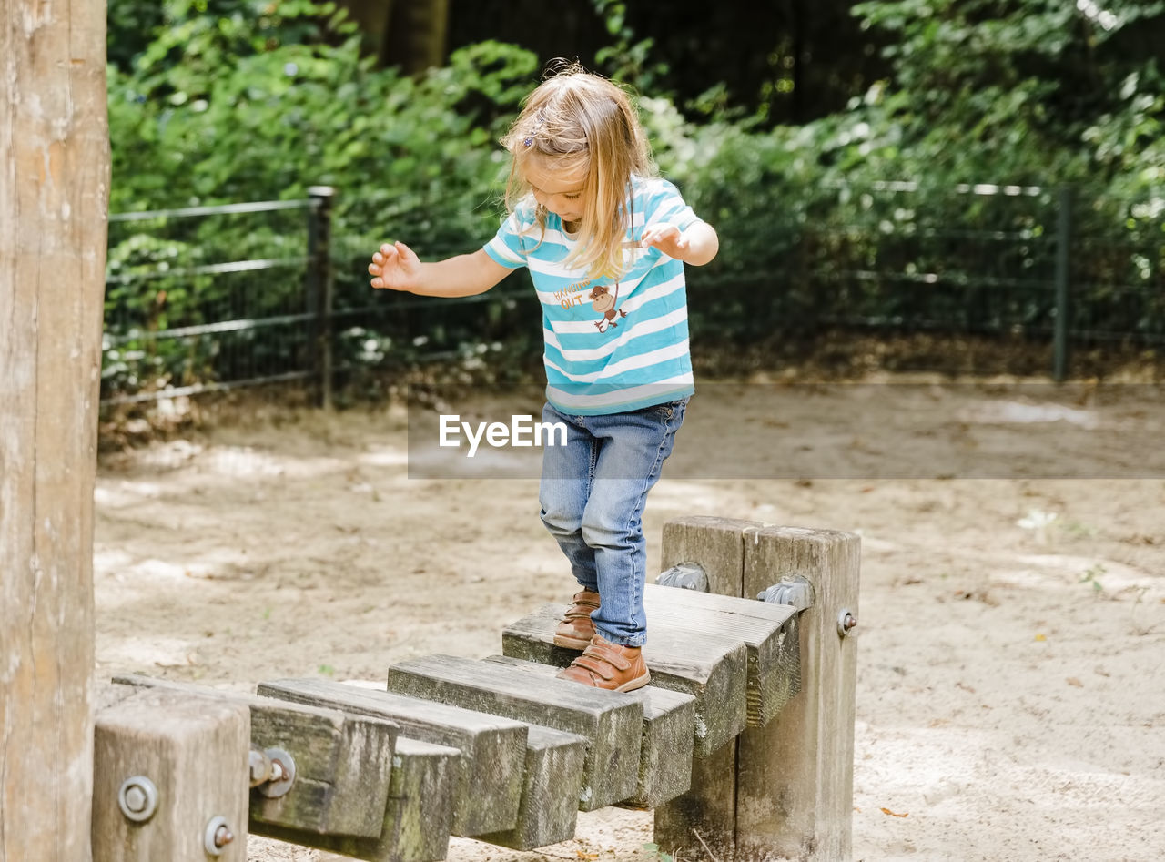 Cute girl playing outdoors