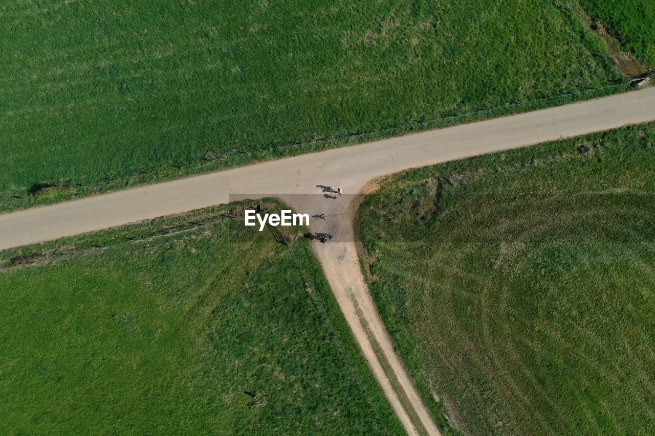 High angle view of road amidst field