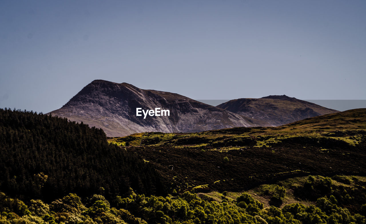 Scenic view of mountains against clear sky