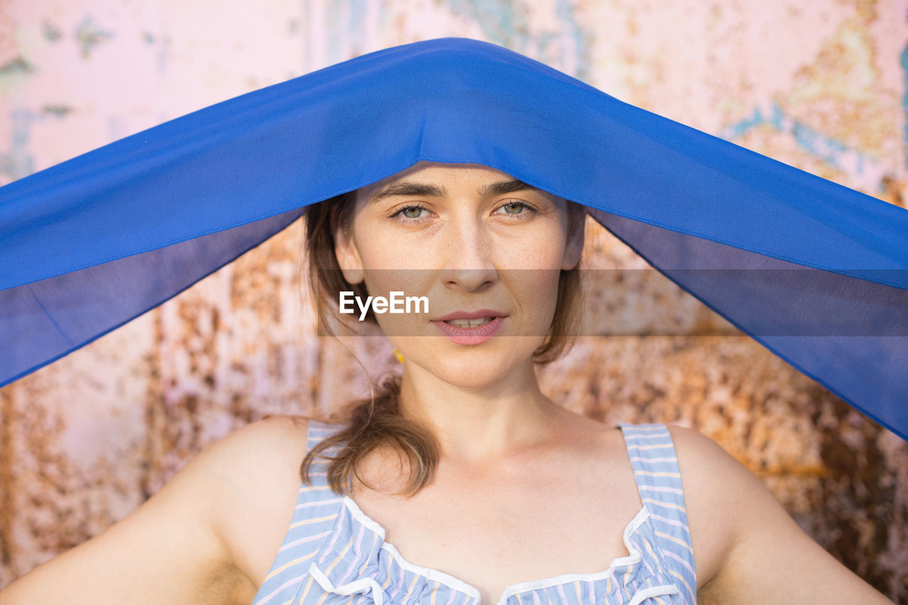 Portrait of woman wearing headscarf