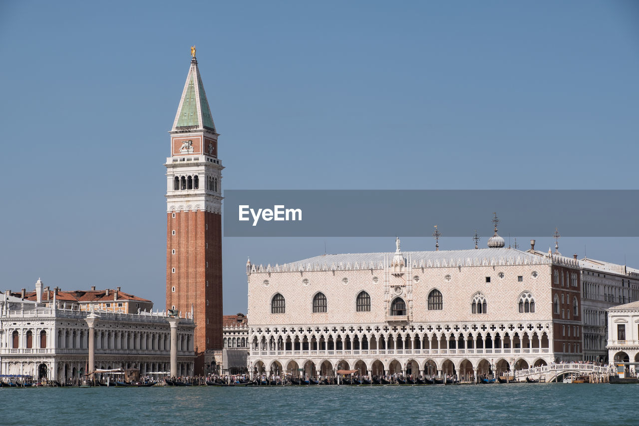 Classic view of venice with the doge's palace and st mark's tower on a clear sunny day.