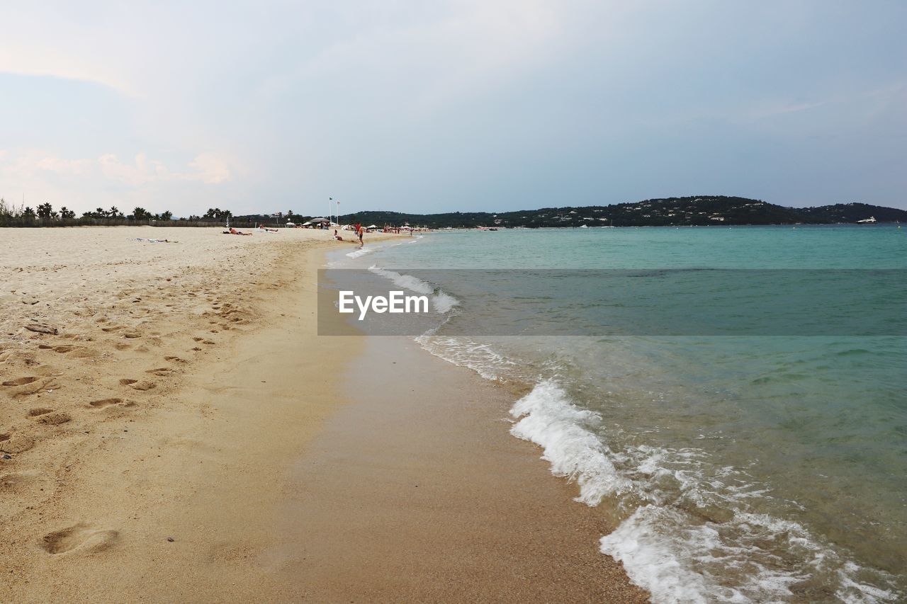 Scenic view of beach against sky