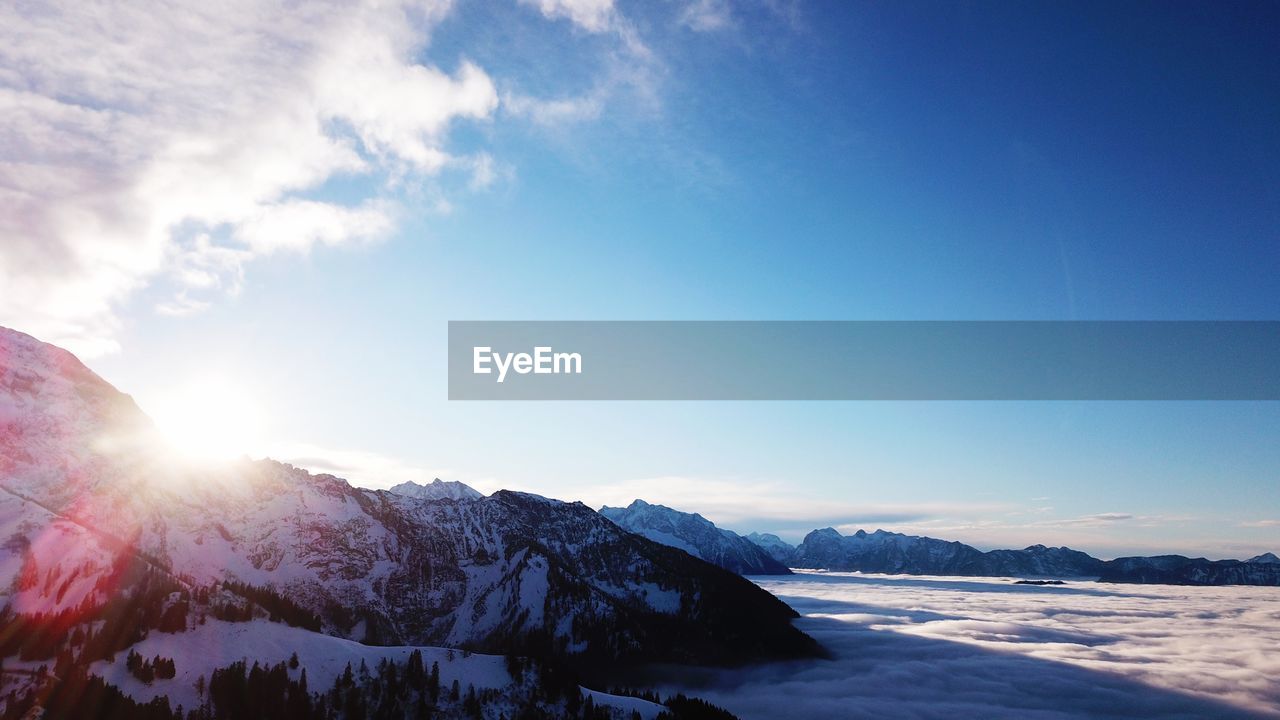 SNOWCAPPED MOUNTAINS AGAINST SKY