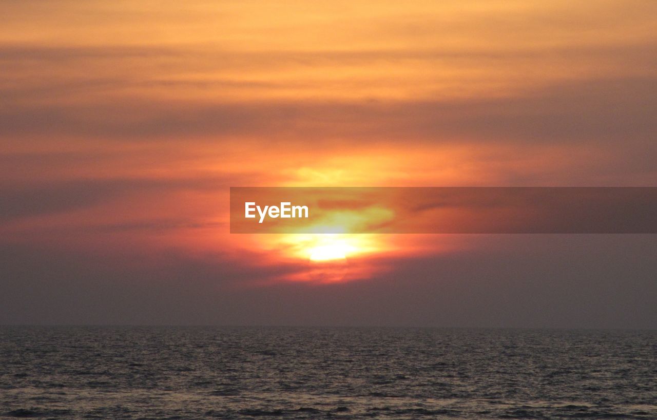 SCENIC VIEW OF SEA AGAINST ROMANTIC SKY