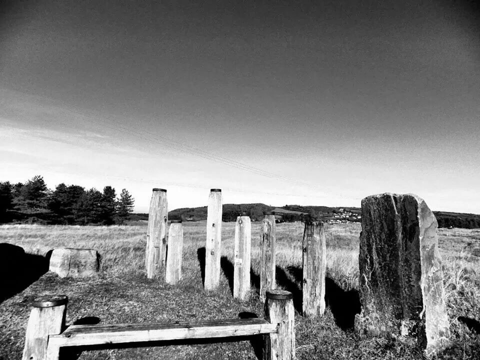 WOODEN STRUCTURE ON FIELD