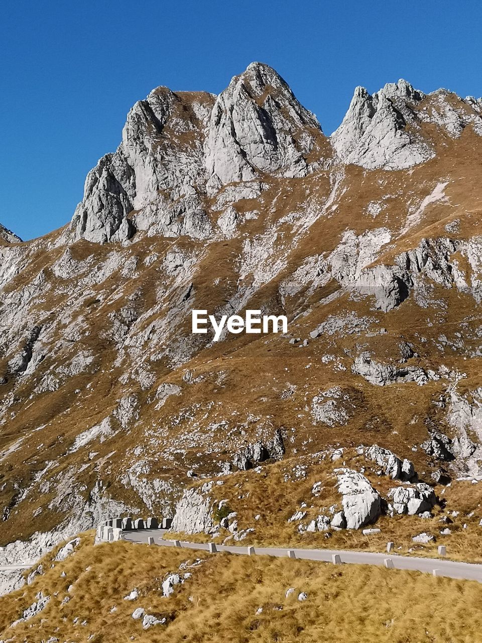 Scenic view of snowcapped mountains against clear sky