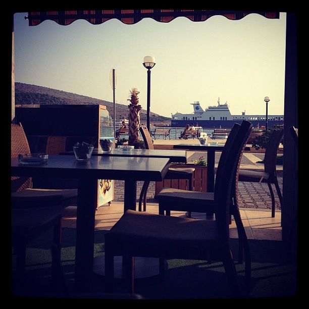 VIEW OF EMPTY CHAIRS AND TABLES