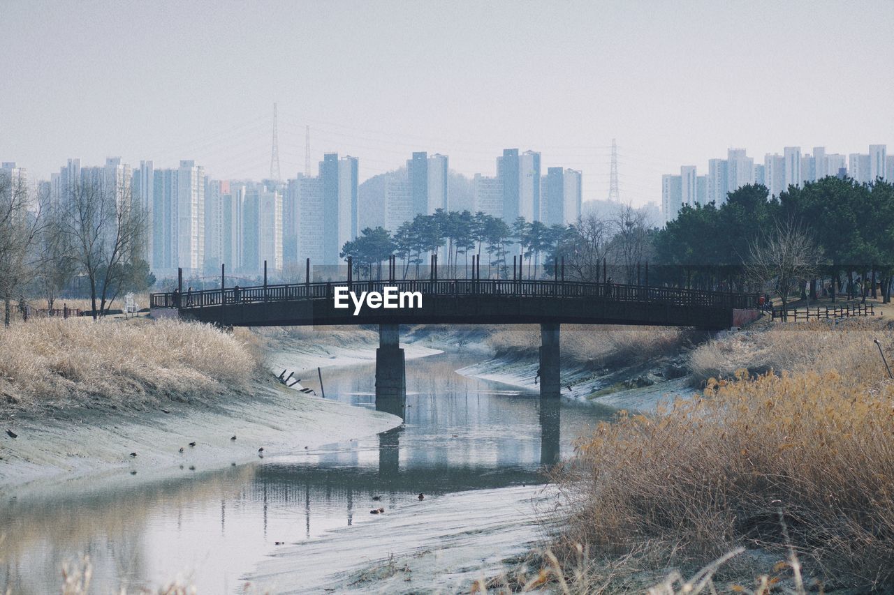 Bridge over river in city