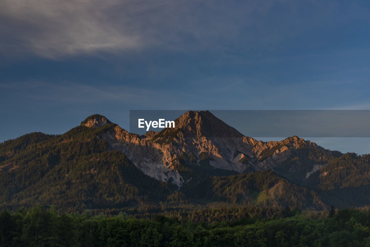 SCENIC VIEW OF MOUNTAIN AGAINST SKY