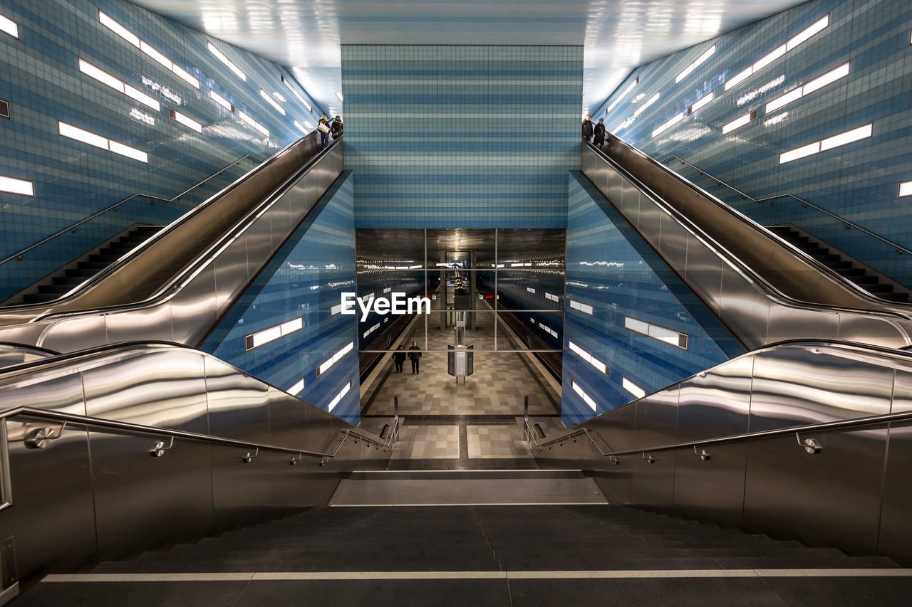 LOW ANGLE VIEW OF ESCALATORS IN BUILDING