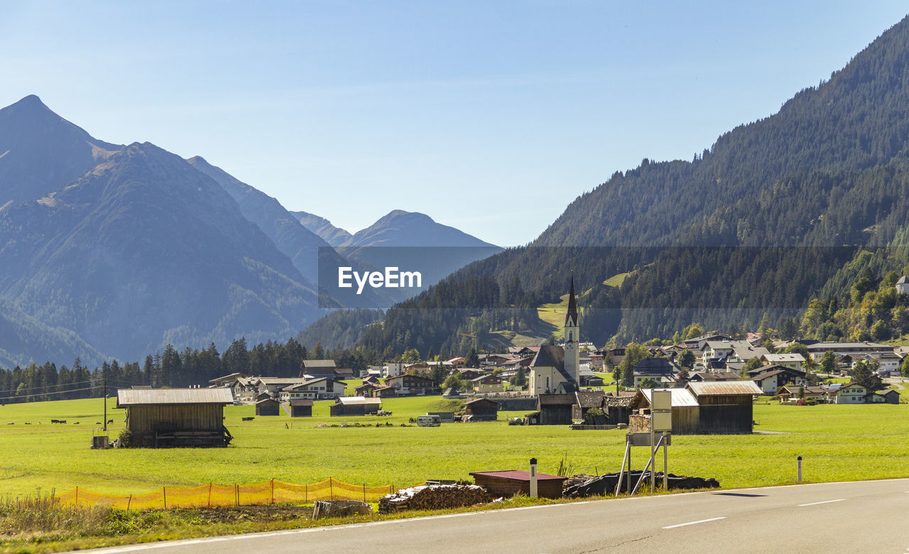 scenic view of landscape and mountains against sky