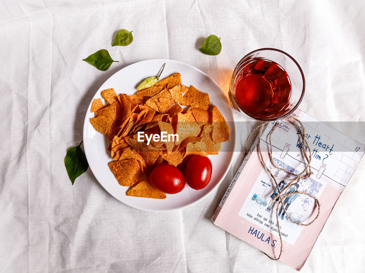 food and drink, food, fast food, high angle view, produce, fruit, healthy eating, no people, drink, indoors, freshness, dish, refreshment, meal, vegetable, textile, studio shot, glass, breakfast, plate, tomato, still life, snack, wellbeing, table, directly above, crockery, paper