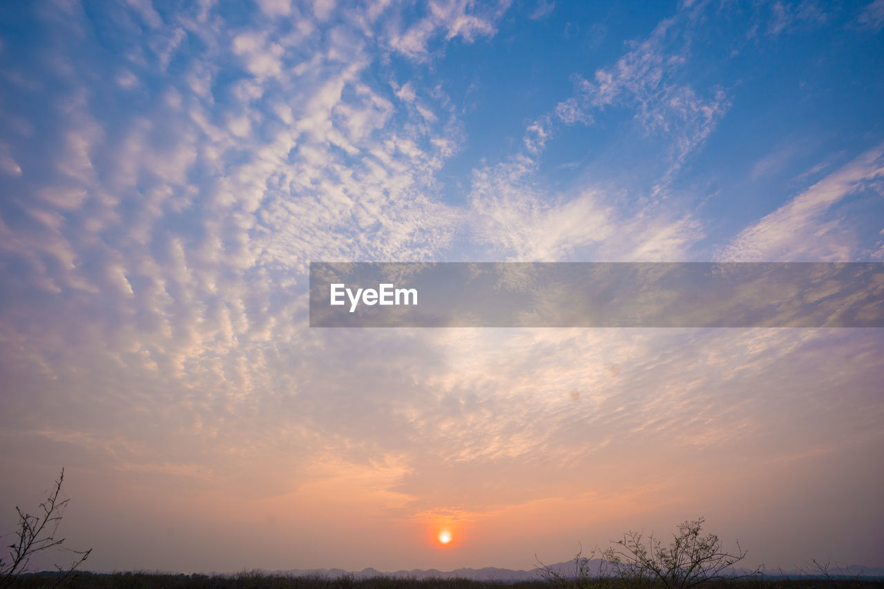 LOW ANGLE VIEW OF SKY AT SUNSET