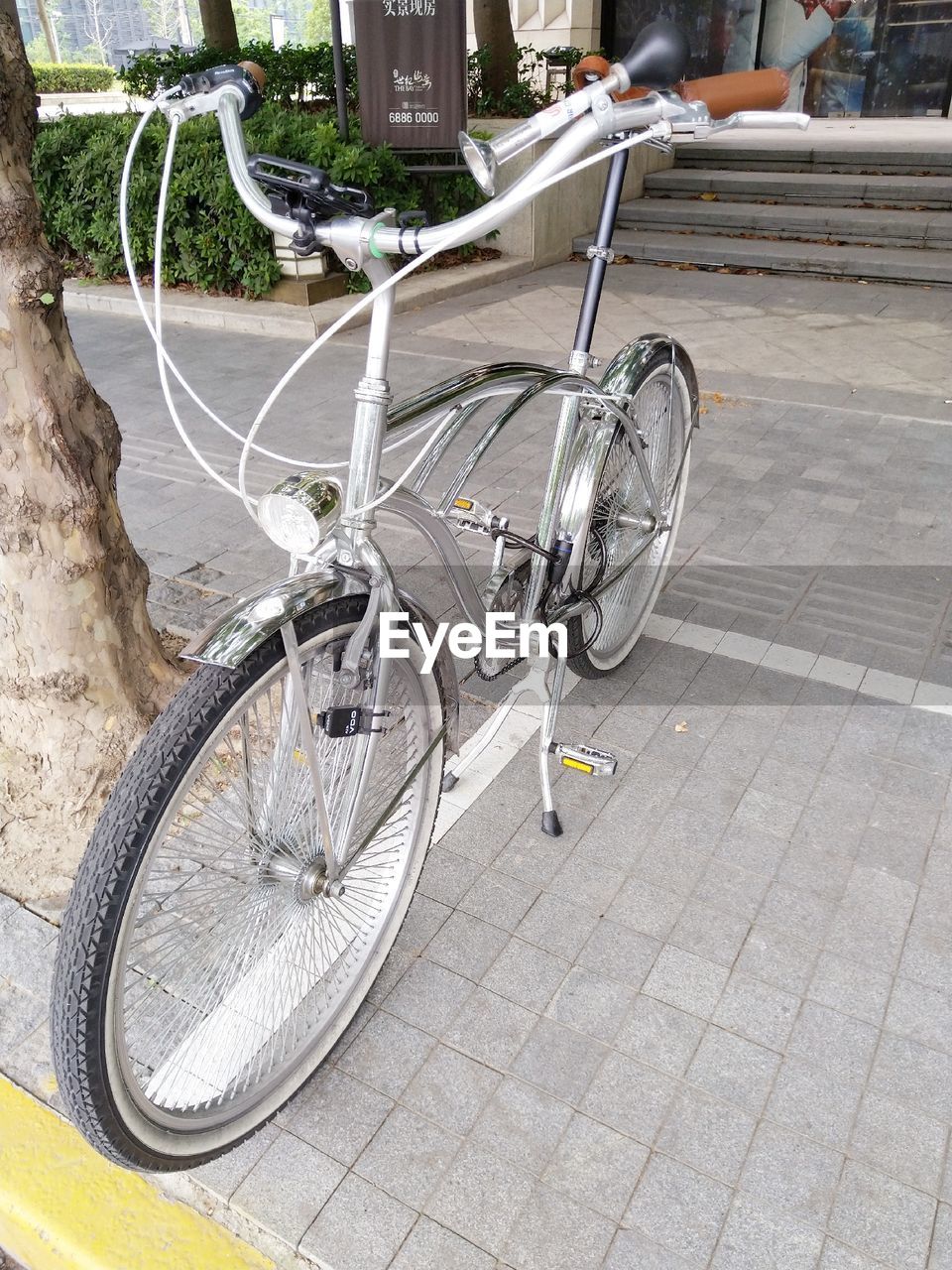 BICYCLES PARKED ON FOOTPATH