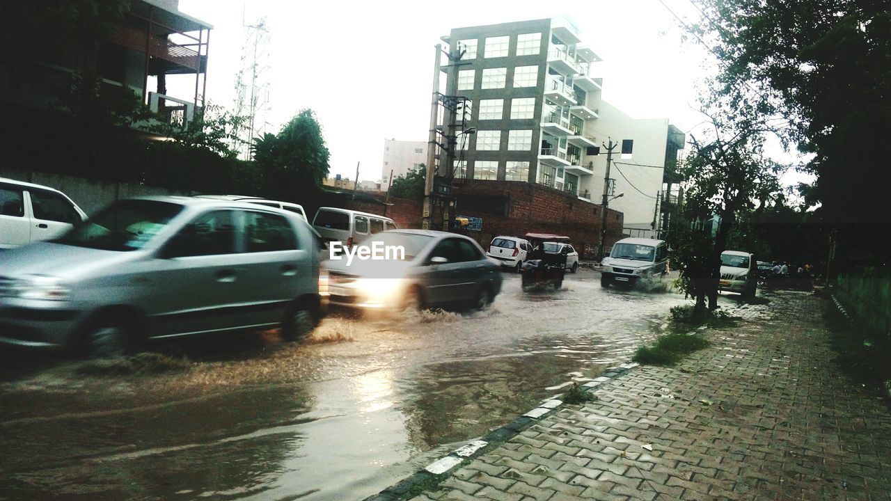 Cars on wet street in rain