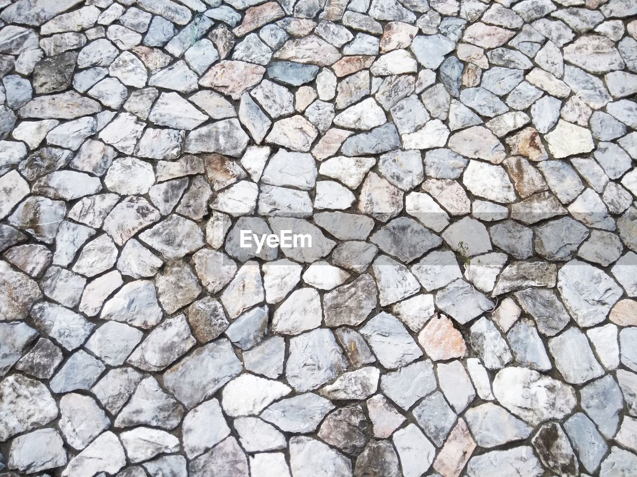 Full frame shot of cobblestone footpath