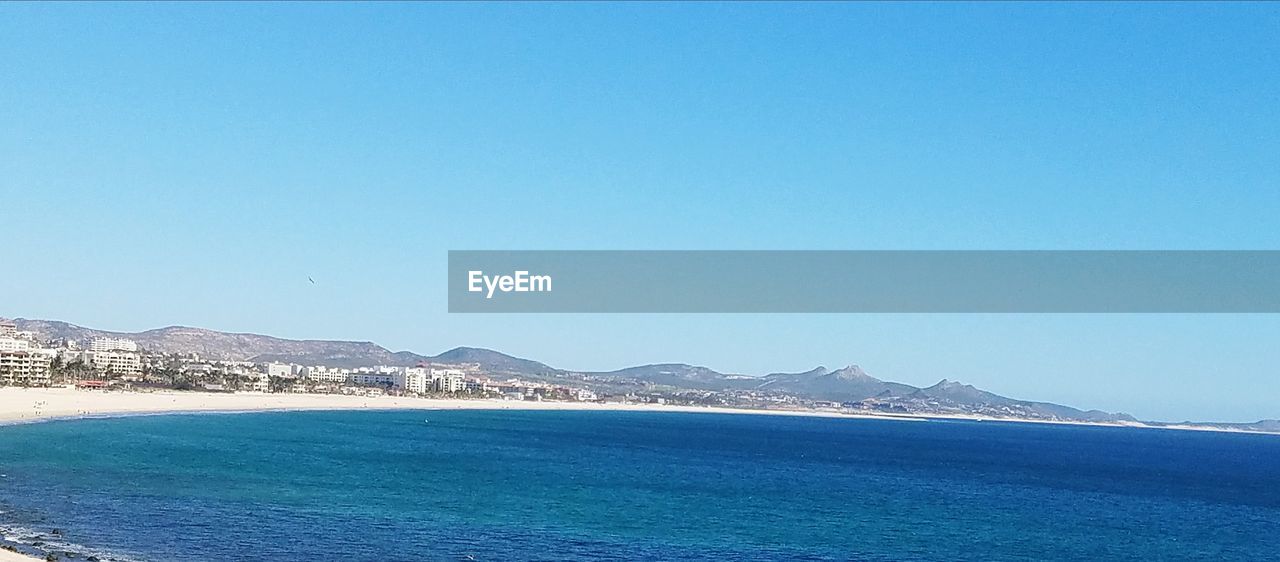 SCENIC VIEW OF SEA AGAINST BLUE SKY