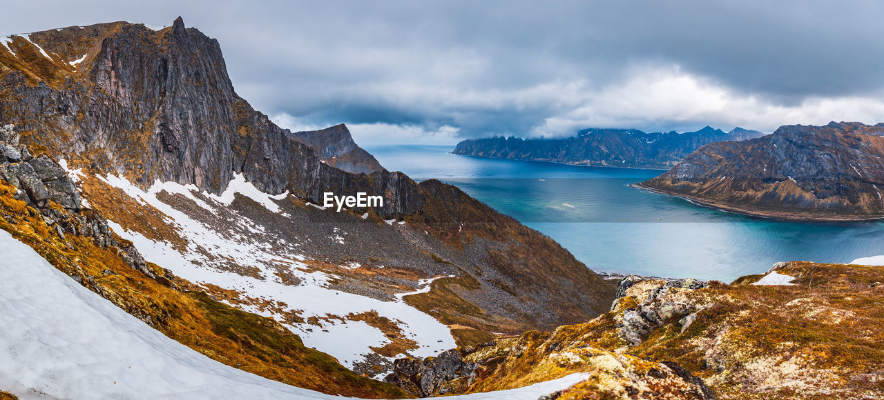 Mountains against sky in winter