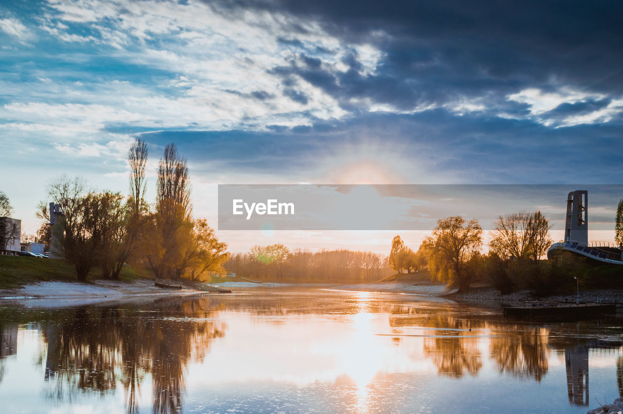 Scenic view of lake at sunset